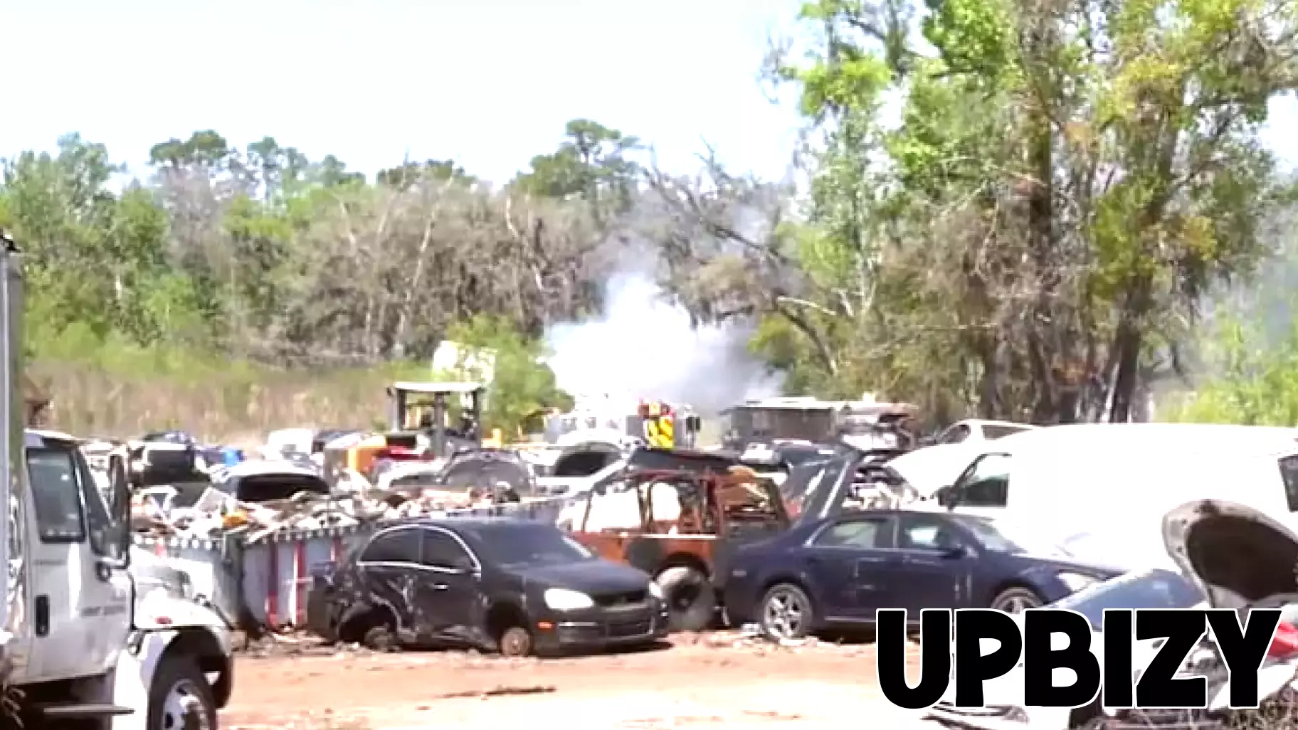 Several vehicles catch fire at used auto parts business on West Beaver Street